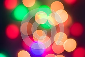 Abstract multi-colored bokeh on a black background