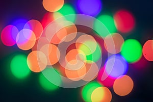 Abstract multi-colored bokeh on a black background