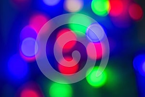 Abstract multi-colored bokeh on a black background
