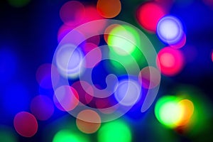 Abstract multi-colored bokeh on a black background