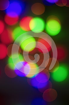 Abstract multi-colored bokeh on a black background