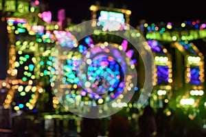 Abstract multi-colored light background with defocused bokeh light. The stage of the entertainment show