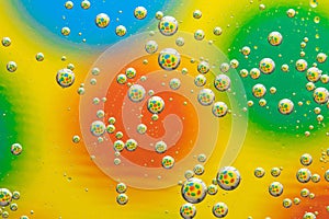 Abstract multicolor background with circles, transparent bubbles, liquid art. Rainbow abstraction, drops pattern, creative