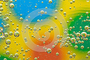 Abstract multicolor bubbles background, circles pattern, liquid art texture. Yellow abstraction with drops, creative geometric
