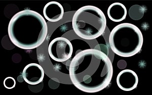 Abstract, multicolored, neon, shiny, bright, black and white, glowing circles, balls, bubbles, light spots with bokeh effect with