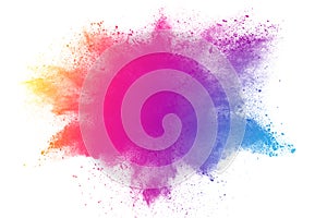 Abstract multicolored powder splatted on white background photo