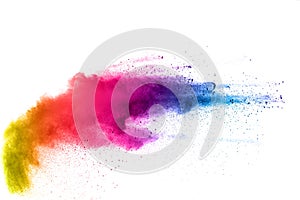 Colored powder splatted on white background photo