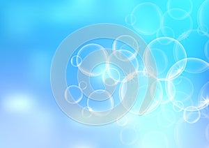 Abstract natural blue sky blurred light and bubbles background