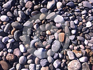 Abstract nautical background with pebbles, top view.