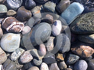 Abstract nautical background with pebbles, top view.