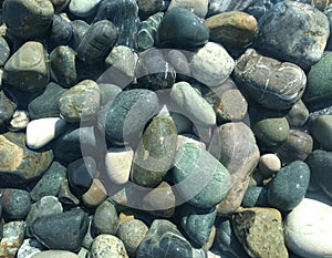 Abstract nautical background with pebbles, top view.