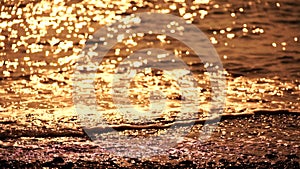 Abstract nautical summer ocean sunset background with blurred waves, sun reflections, and bokeh. Seamless panorama and