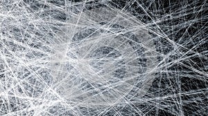 Abstract network of intersecting white lines on a black background