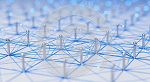 Abstract Network of Pins and Blue Strings on a White Background connection technology