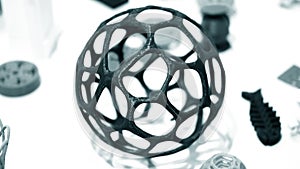 Abstract object of a blue color printed on a 3d printer on a white table.