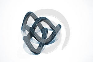 Abstract object printed by 3d printer on white background.