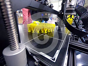 Abstract object printing 3D printer molten plastic close-up 3D printer printing