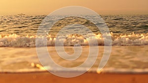 Abstract ocean sunset background with blurred waves, sun reflections, and bokeh. Seamless panorama and sky replacement