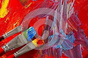 Abstract oil painting with paintbrushes