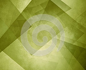 Abstract olive green geometric background with layers of triangles and rectangles with distressed texture design photo