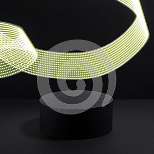 Abstract one black round podium for cosmetic products with glowing neon yellow light stripe in motion, mockup on black background