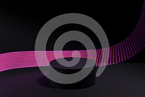 Abstract one black round podium with glowing neon pink purple light stripe as motion trail for cosmetic products