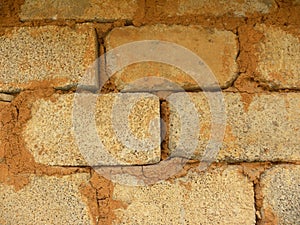 Abstract orange color concrete brick wall textured background