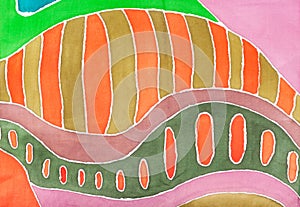 Abstract orange geometric pattern on silk batik