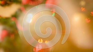 Abstract out of focus background with glowing Christmas lights and golden bokehs