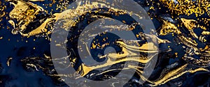 Abstract painting with gold and black color paint. Luxury oilpaint glitter design. Fine art creative wallpaper. Artwork golden