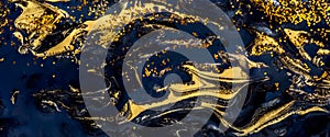 Abstract painting with gold and black color paint. Luxury oilpaint glitter design. Fine art creative wallpaper. Artwork golden photo