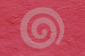 Abstract panoramic image of a red clay wall.