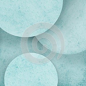 Abstract pastel blue circle geometric background with layers of round circles with distressed texture design