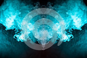 Abstract pattern of colored smoke backlit blue and turquoise in