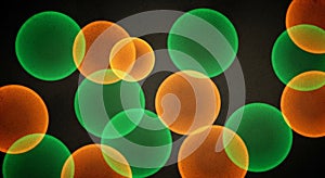 Abstract Pattern of Overlapping Green and Orange Circles with a Textured Background image