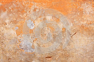 Abstract pattern on an old wall with the texture of old peeling plaster