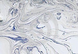 Abstract pattern, Traditional Ebru art. Color ink paint with waves. Marble background.