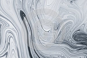 Abstract pattern, Traditional Ebru art. Color ink paint with waves. Marble background. photo