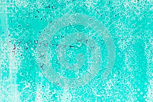 Abstract pattern on turquoise background closeup