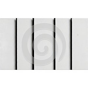 Abstract pattern of vertical white panels separated by thin black lines creating a minimalist geometric design