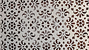 Abstract pattern on white plastic. Background. Texture. Abstract drawing for background and texture. Stencil for drawing
