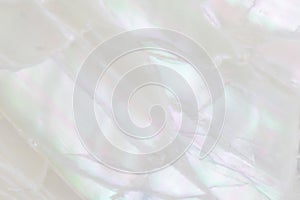 Abstract pearl background with soft shimmering mother of pearl lilac and rainbow colours