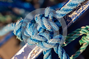 An abstract photo of Blue rope tied in a knots taken on may 7th 2021