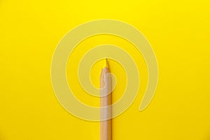 Abstract photo with yellow pencil on yellow background for concept design