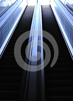 Abstract photograph of long escalators at the exit of one of the Istanbul metros. photo