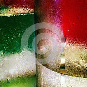 Abstract picture of condensation on two bottle with red and green color