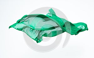 Abstract piece of green fabric flying