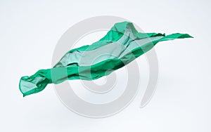 Abstract piece of green fabric flying