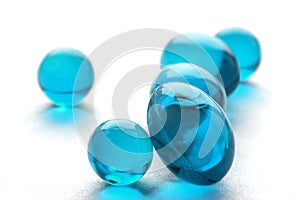 Abstract pills in cyan color