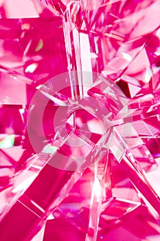 Abstract pink background of crystal refractions